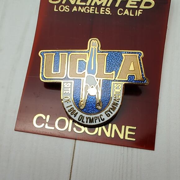 1984 Los Angeles UCLA Olympic Rings Handstand Gymnastics Sports Venue Pin - Picture 1 of 3